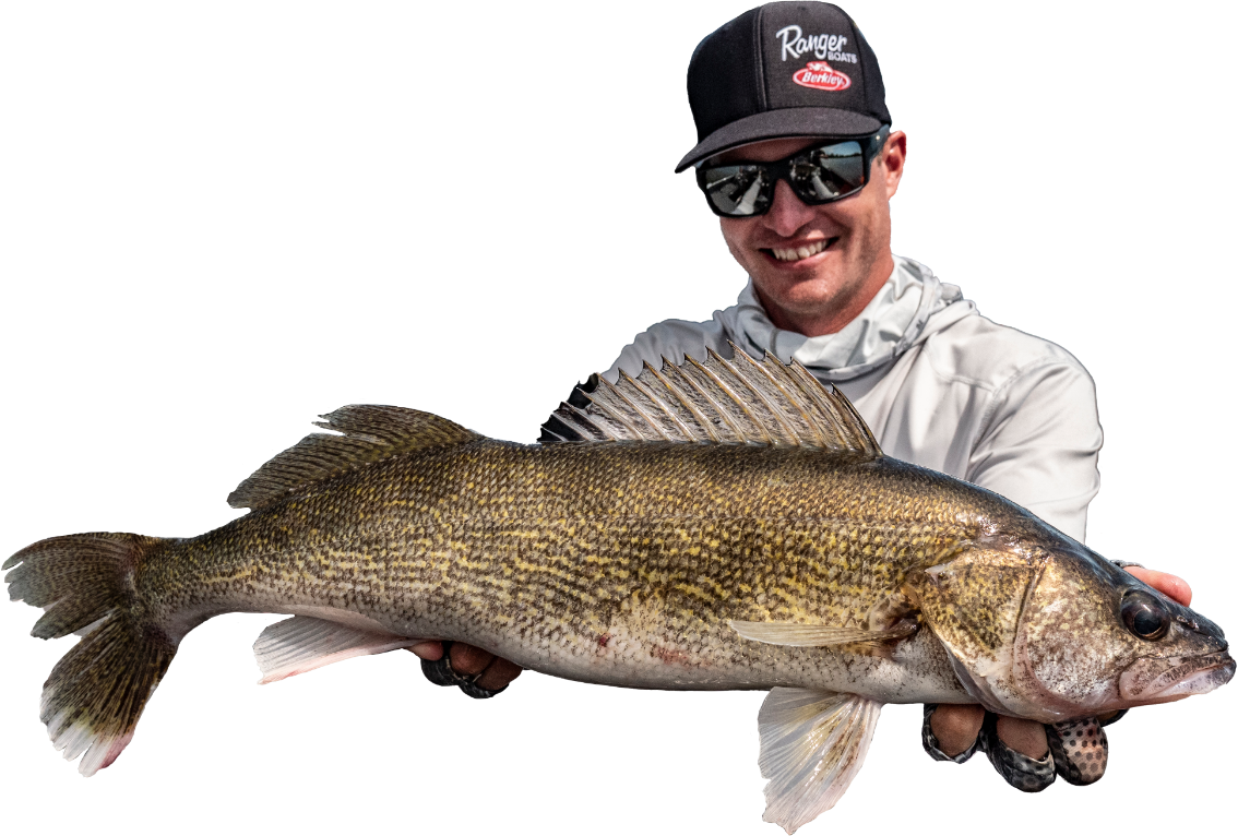 Kenny Sprengel smiling and holding fish